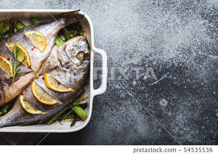 Fish dorado baked with asparagus Fish dorado baked with asparagus 54535536