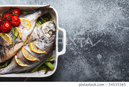 Fish dorado baked with asparagus Fish dorado baked with asparagus 54535565