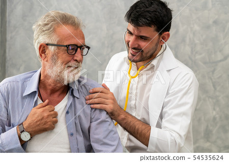 Senior patient visits doctor at the hospital. 54535624