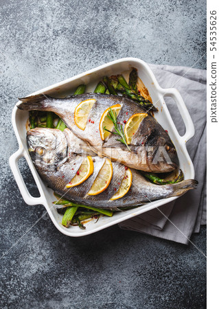 Fish dorado baked with asparagus Fish dorado baked with asparagus 54535626