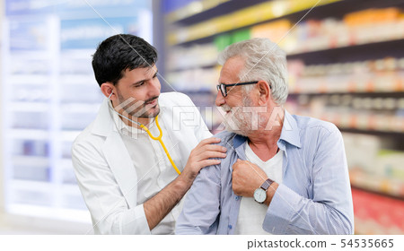 Doctor checking patient health in hospital office. Doctor checking patient health in hospital office. 54535665