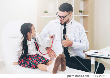 Happy little kid visit doctor in hospital office. Happy little kid visit doctor in hospital office. 54535958