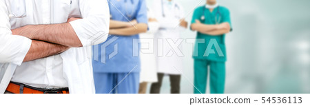 Doctor working in hospital with other doctors. Doctor working in hospital with other doctors. 54536113