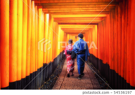 Traveler in Fushimi Inari Shrine, Kyoto, Japan Traveler in Fushimi Inari Shrine, Kyoto, Japan 54536197