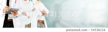 Doctor working in hospital with other doctors. 54536216