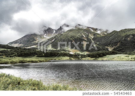 landscape with green plains and lake on Kamchatka peninsula, Russia landscape with green plains and lake on Kamchatka peninsula, Russia 54543463