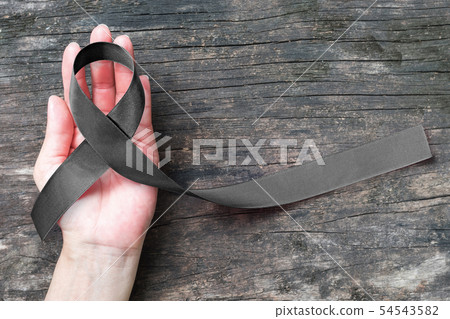 Black Ribbon awareness on Melanoma and skin cancer 54543582