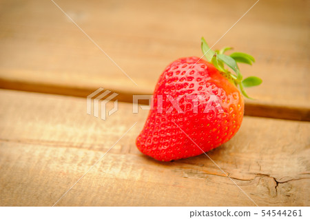 Red strawberries and wood backgrounds Red strawberries and wood backgrounds 54544261