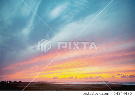 The beach at dusk 54544480