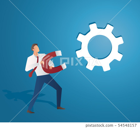 man holding a large magnet attract to gear man holding a large magnet attract to gear 54548157