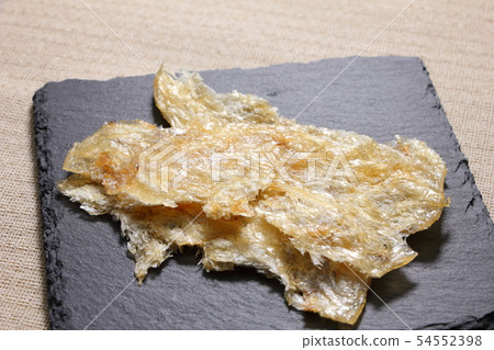 A snack and grilled on a slate plate. A snack and grilled on a slate plate. 54552398