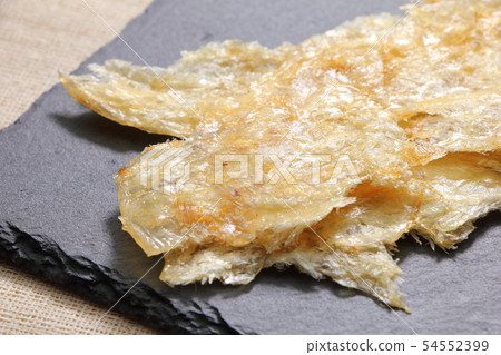 A snack and grilled on a slate plate. A snack and grilled on a slate plate. 54552399