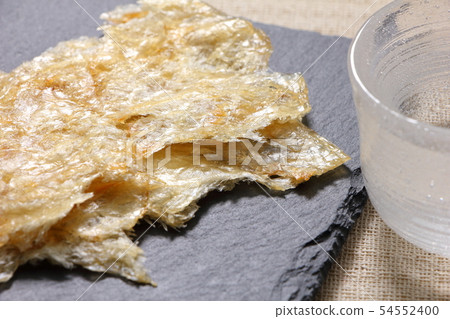 A snack and grilled on a slate plate. A snack image of sake. 54552400