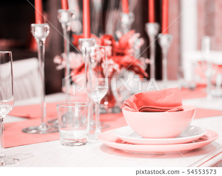Beautiful table setting in Living Coral color Beautiful table setting in Living Coral color 54553573