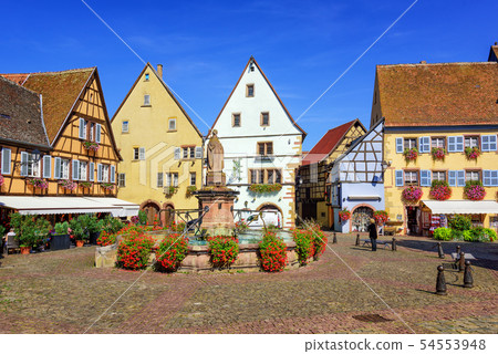 Colorful half-timbered houses in Eguisheim, France Colorful half-timbered houses in Eguisheim, France 54553948