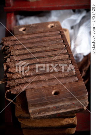 Cigar rolling or making by torcedor in cuba Cigar rolling or making by torcedor in cuba 54554299