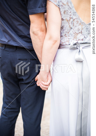 Elegant gentle stylish groom and bride near river Elegant gentle stylish groom and bride near river 54554868