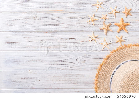 Summer holiday background with straw hat and 54556976