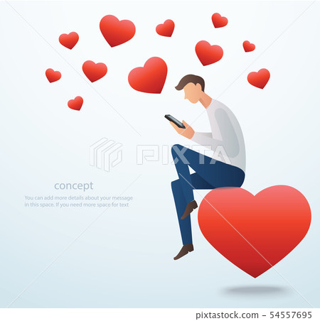 man holding a smartphone sitting on the red heart man holding a smartphone sitting on the red heart 54557695