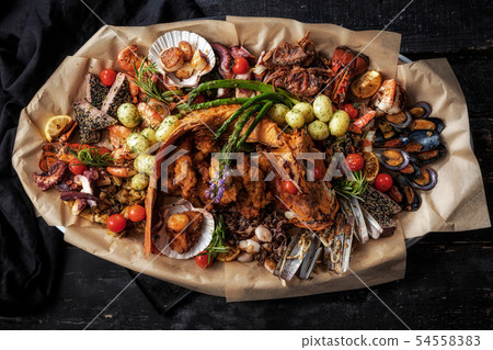 Dish of seafood. Assorted seafood. 54558383