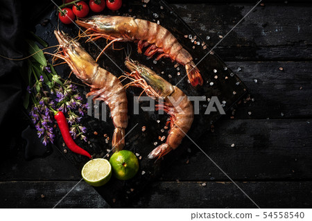 Sea delicacies. Fresh seafood. Tiger shrimp. 54558540