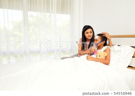 Young asian mother child sick care 54558946