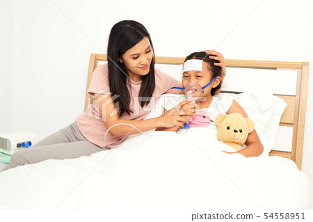 Young asian mother child sick care 54558951