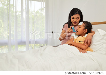 Young asian mother child sick care 54558976