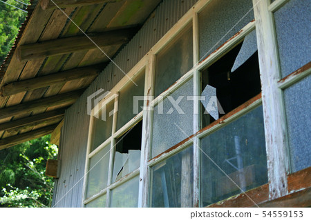 Broken window glass 54559153