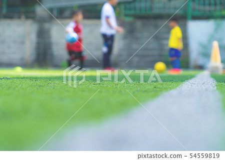 Soccer Academy field for children training blurred Soccer Academy field for children training blurred 54559819