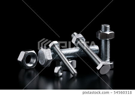Bolts and nuts of different sizes. 54560318