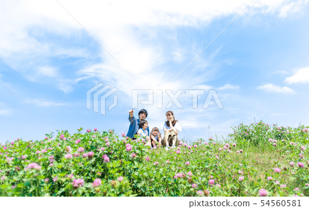 Family, blue sky, picnic, pointing finger Family, blue sky, picnic, pointing finger 54560581