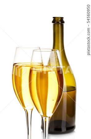 Two glasses of champagne on white background. Two glasses of champagne on white background. 54560950