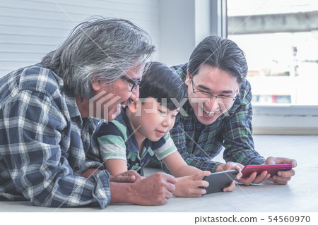 Happy Three generation of male is learning to use Happy Three generation of male is learning to use 54560970