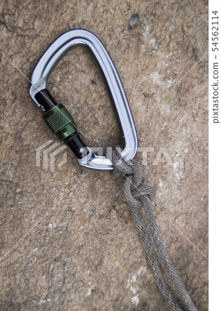 Image of a carabiner hook and rope Image of a carabiner hook and rope 54562114