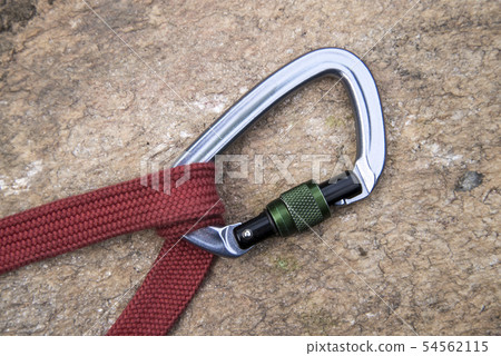 Image of a carabiner hook and red rope Image of a carabiner hook and red rope 54562115