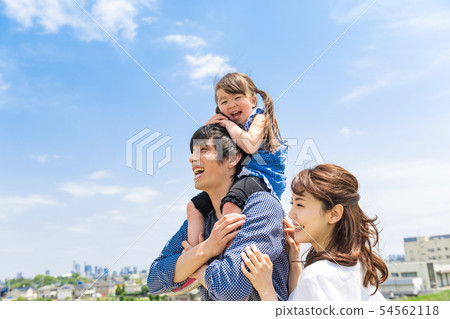 Family, blue sky, shoulder car, looking up Family, blue sky, shoulder car, looking up 54562118