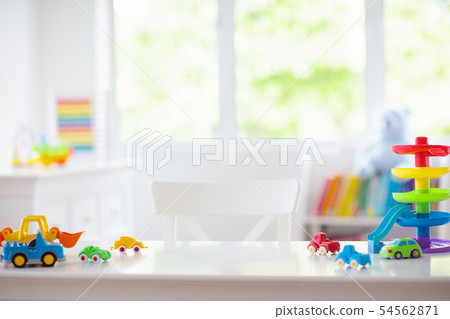 Little boy room. Toy cars at desk. Car toys. Little boy room. Toy cars at desk. Car toys. 54562871