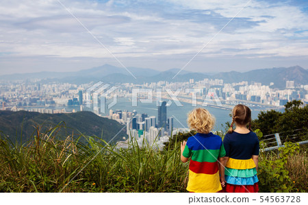 Family hiking in Hong Kong mountains Family hiking in Hong Kong mountains 54563728