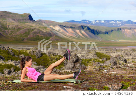 Fitness woman exercising in nature 54564186