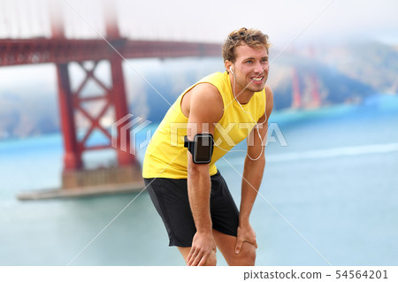 Running man - male runner resting in San Francisco 54564201