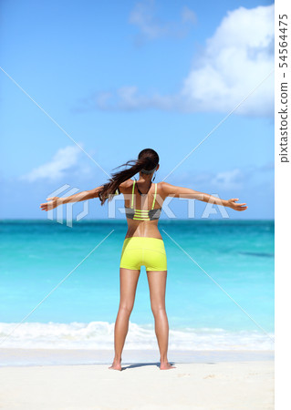 Happy running woman winning - fitness success Happy running woman winning - fitness success 54564475