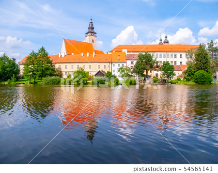 Panoramic view of Telc Castle. Water reflection, Czech Republic. UNESCO World Heritage Site. Panoramic view of Telc Castle. Water reflection, Czech Republic. UNESCO World Heritage Site. 54565141
