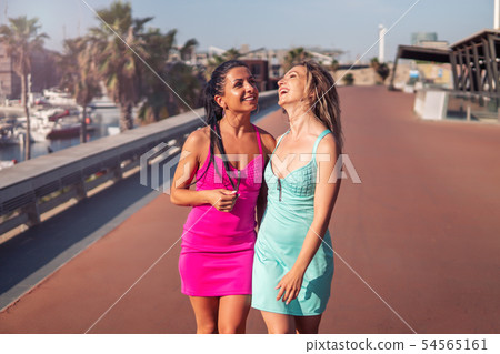 Happy best friends or sisters posing and showing lovely relationship 54565161
