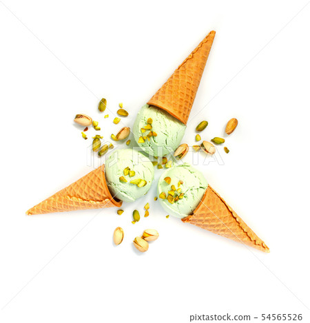 Three waffle cones with pistachio ice cream Three waffle cones with pistachio ice cream 54565526