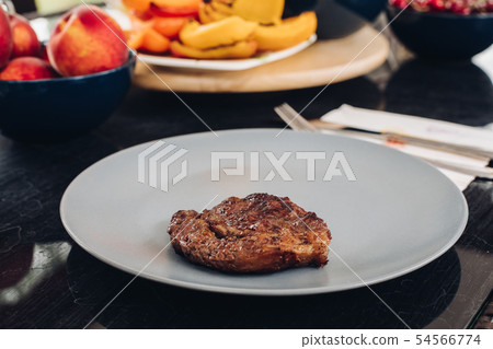 Table with appetizing fresh food barbeque meat on 54566774