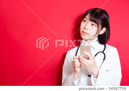 Medical woman in white coat 54567750