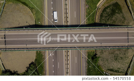 View from above of highway intersection car bridge and moving cars 54570558