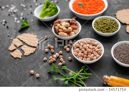 Healthy vegan food on a concrete background  54571754