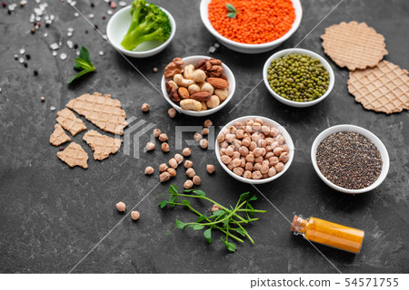 Healthy vegan food on a concrete background  54571755